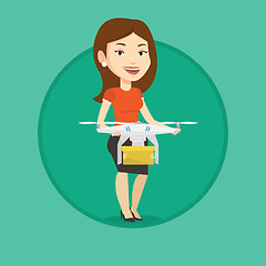 Image showing Woman controlling delivery drone with post package