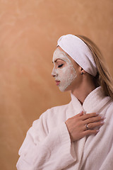 Image showing Spa Woman applying Facial Mask