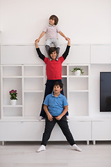 Image showing young boys posing line up piggyback