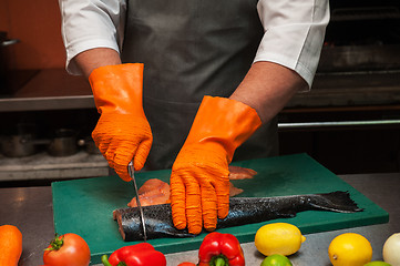 Image showing cutting salmon fish