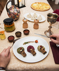 Image showing Man eating in georgian restaurant