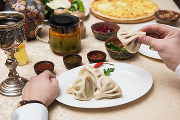 Image showing Man eating in georgian restaurant