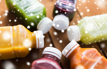 Image showing bottles with different fruit or vegetable juices