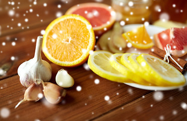 Image showing garlic, lemon, orange and other folk remedy