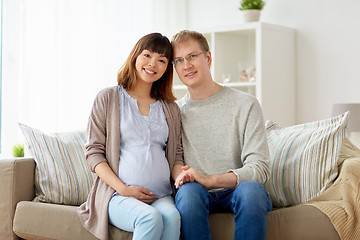 Image showing happy pregnant wife with husband at home