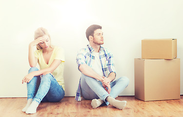 Image showing unhappy couple having argument at home