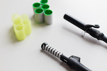 Image showing curling irons or hot stylers and hair curlers