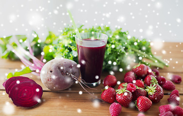 Image showing glass of beetroot juice, berries and vegetables