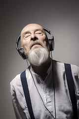 Image showing elderly male portrait with headphones