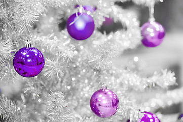 Image showing Red baubles on silver artificial christmas tree