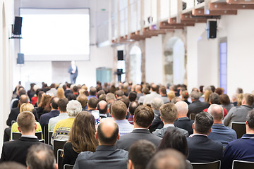 Image showing Business speaker giving a talk at business conference event.