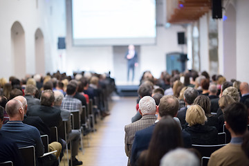 Image showing Business speaker giving a talk at business conference event.