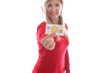 Image showing Woman holding crypto coins and paper wallet