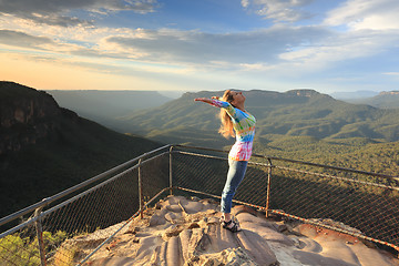 Image showing Female embrace the new day with positive affirmations Blue Mount