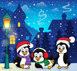 Image showing Christmas penguins thematic image 1