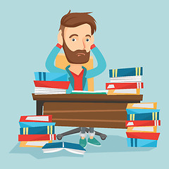 Image showing Student sitting at the table with piles of books.