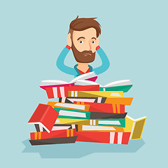 Image showing Student sitting in huge pile of books.