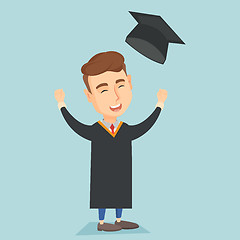 Image showing Graduate throwing up graduation hat.