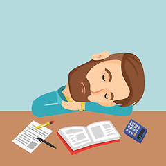 Image showing Student sleeping at the desk with book.