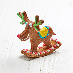 Image showing gingerbread deer on white wooden table