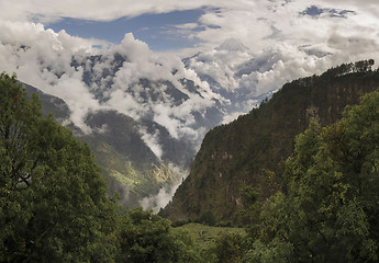 Image showing Nilgiri summit and cloudy Himalayas