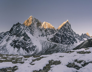 Image showing Taboche and Cholatse summits and sunrise