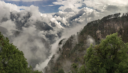 Image showing Nilgiri summit and cloudy Himalayas