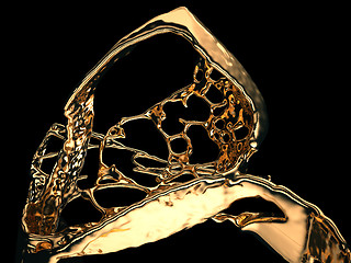 Image showing Liquid gold or oil splatter and splashes isolated on black