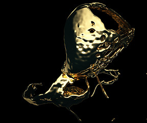 Image showing Liquid gold or oil splashes isolated on black