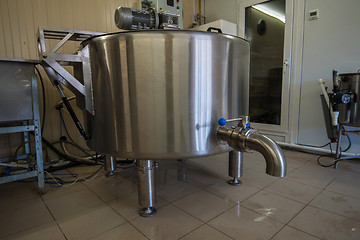 Image showing Cheese production at dairy farm