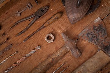 Image showing Collection of vintage tools on wooden background