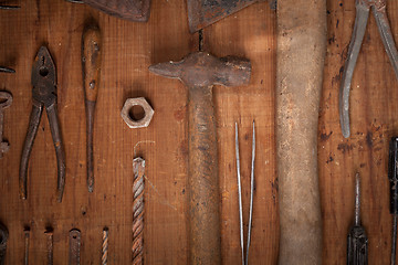 Image showing Collection of vintage tools on wooden background