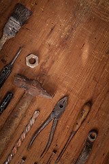 Image showing Collection of vintage tools on wooden background