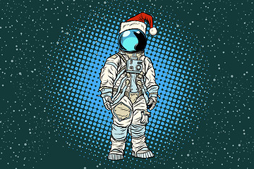 Image showing Christmas lone astronaut in the Santa hat