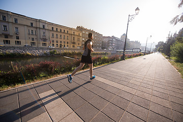 Image showing man jogging at sunny morning