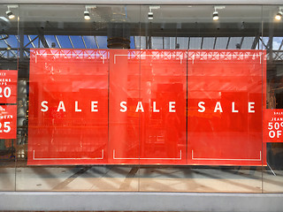 Image showing Large Sale Banners hanging in show window display