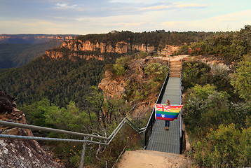 Image showing Australia Said Yes Woman crossing bridge with Flag