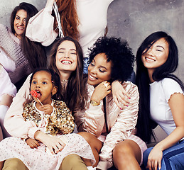 Image showing Lifestyle and people concept: young pretty diversity nations woman with different age children celebrating on birth day party together happy smiling, making selfie. African-american, asian and caucasi