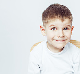 Image showing little cute adorable boy posing gesturing cheerful on white background, lifestyle people concept
