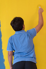 Image showing Portrait of a happy young boy painter