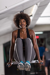 Image showing black woman doing parallel bars Exercise