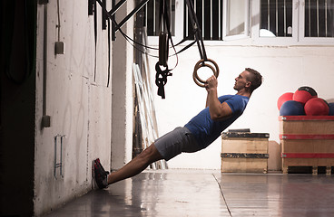 Image showing man doing dipping exercise