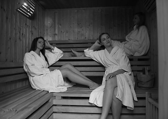 Image showing a group of young women in a sauna