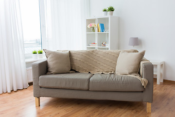 Image showing sofa with cushions at cozy home living room