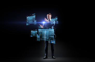 Image showing businessman in suit with virtual projection