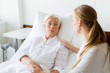 Image showing daughter visiting her senior mother at hospital