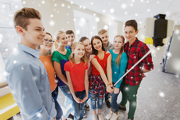 Image showing group of students taking selfie with smartphone