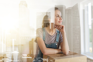 Image showing happy woman with box moving to new home