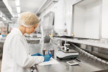 Image showing woman working at ice cream factory