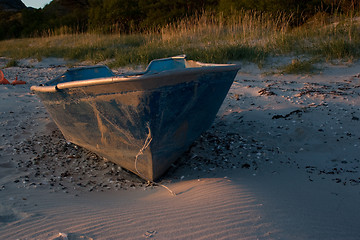 Image showing Stranded old boat at the beach